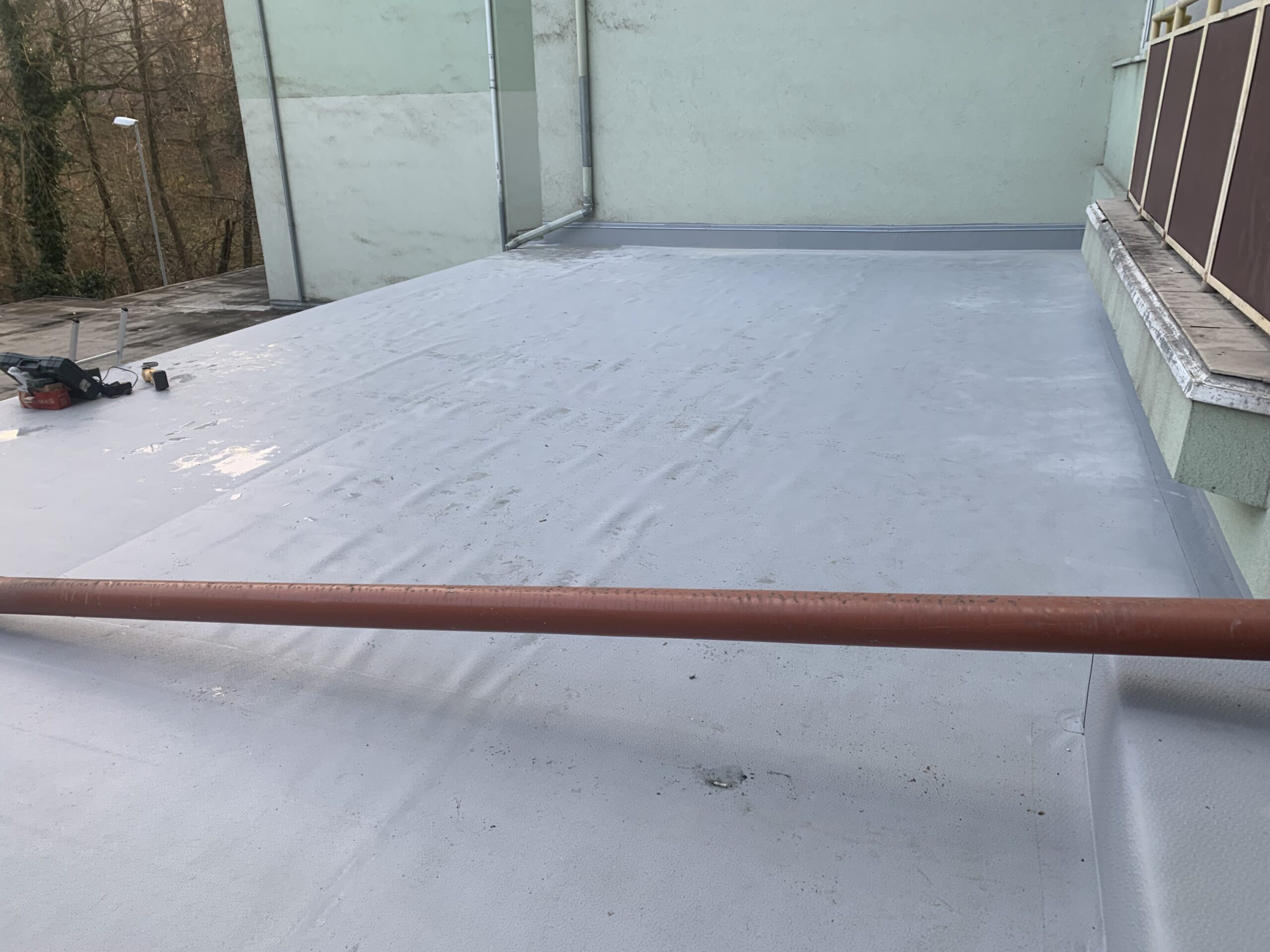 Plochá strecha po oprave (Gattendorf, Rodinný dom) – MyRoof